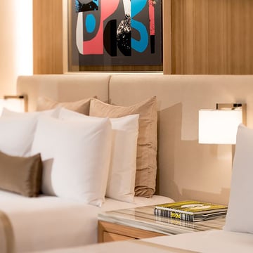 Astro Ravello wall lights - hotel guest room bedside