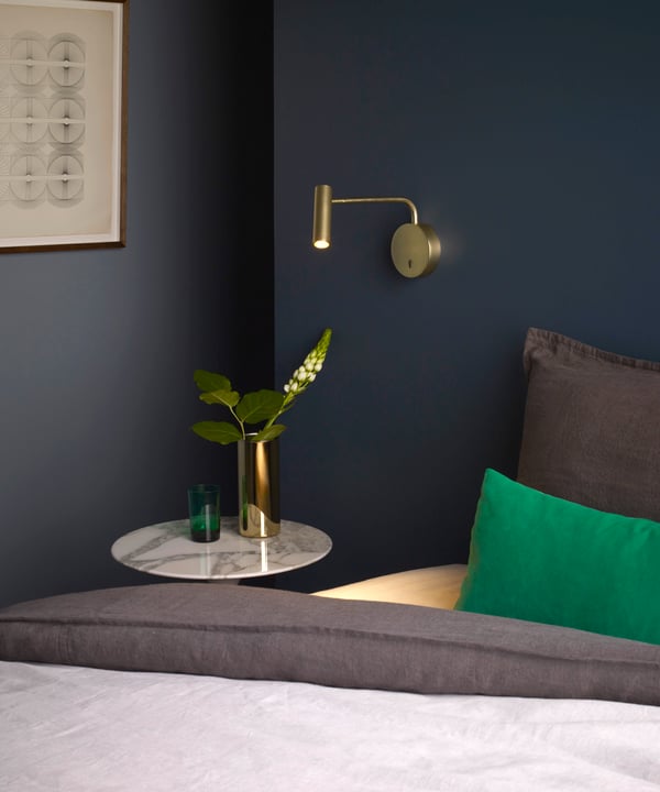 Astro Enna Swing wall light, in Matt Gold - bedside